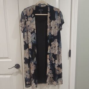 Summer casual dress. Size 14w black with light color floral pattern